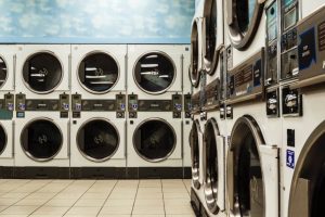 Industrial washer in a professional laundry facility