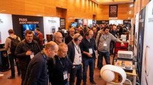 Audiophile visitors exploring hi-fi equipment at Paris Audio Video Show 2026 inside Palais des Congrès